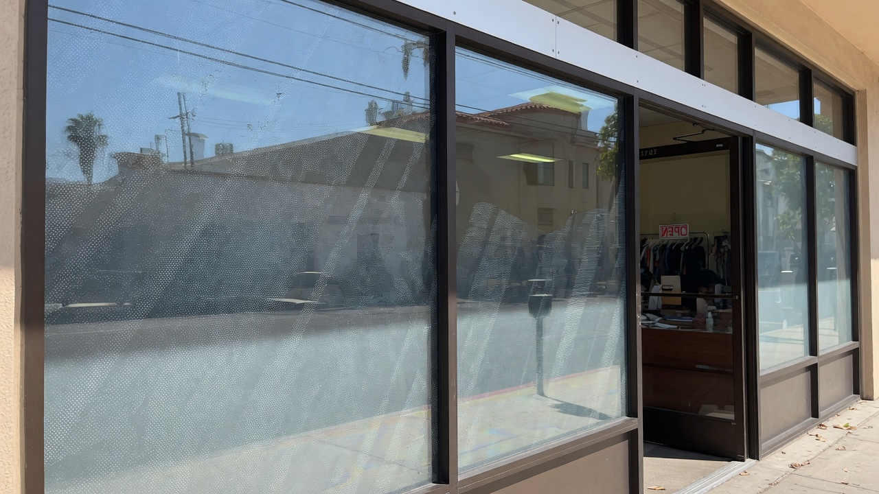 Perforated one-way vision window graphics on an Irvine storefront